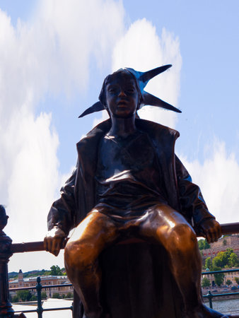 Statue of the Boy Jester on the banks of the River Danube in Budapest Hungaryのeditorial素材