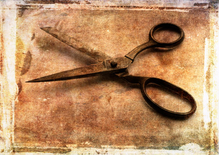Vintage scissors on distressed background