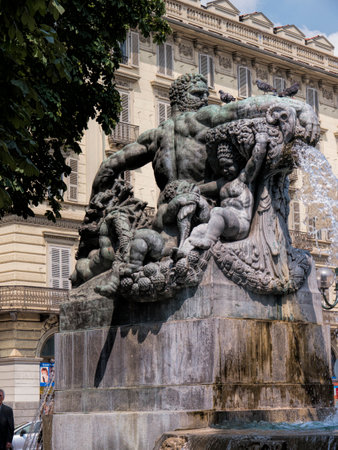 Flower filled Park on Piazza Solferino with Fountains and Statues in Turin Italyのeditorial素材