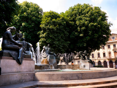 Flower filled Park on Piazza Solferino with Fountains and Statues in Turin Italyのeditorial素材