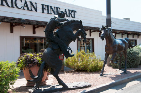 Statue of Cowboy Rider in the Old Town of Scottsdale Arizona USAのeditorial素材