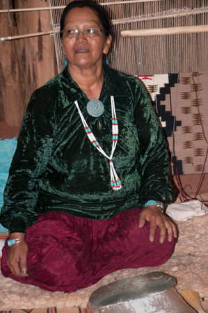 Demonstration of Navajo life in a traditional Hogan in Monument Valley USAのeditorial素材