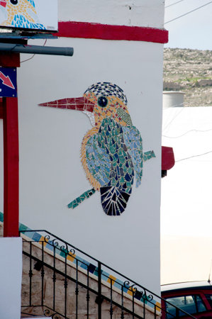 Kingfisher Mosaic on house by the sea on the island of Maltaのeditorial素材
