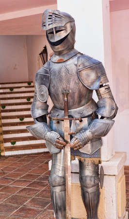 Suit of Armour in Mijas one of the most beautiful 'white' villages of Andalucia. It is in the Alpujarra mountains above the coastの写真素材
