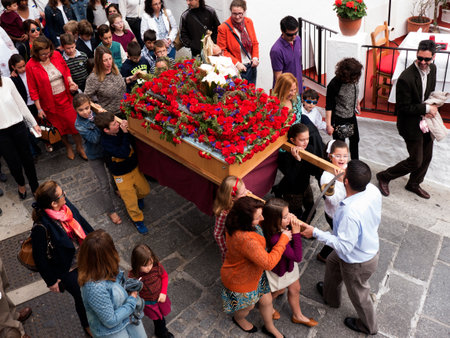 Easter procession in Mijas one of the most beautiful 'white' villages of Andalucia. It is in the Alpujarra mountains above the coastのeditorial素材