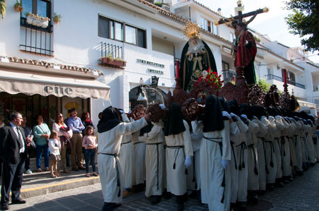 Easter procession in Mijas one of the most beautiful 'white' villages of Andalucia. It is in the Alpujarra mountains above the coastのeditorial素材