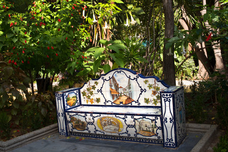 Tiled benches in the gardens in the Stylist Town of Marbella on the Costa del Sol Spainのeditorial素材