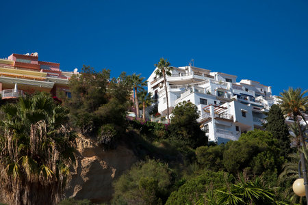Houses overlooking the Burriana beach at Nerja Andalucia Spainのeditorial素材