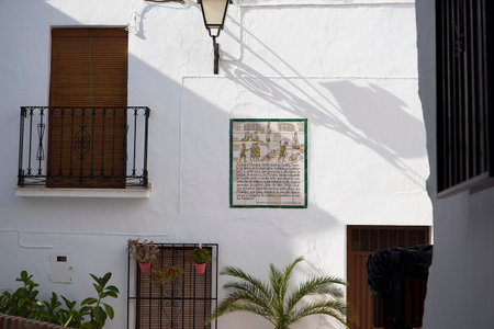 One of the ceramic plaques that tell the story of Frigiliana in Andalucia Spain which shows the Moorish villages last battle against the Christians in 1496のeditorial素材