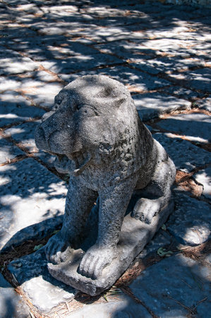 Stone Lion in Sao Jorge Castle which is a Moorish castle occupying a commanding hilltop overlooking the historic centre of the Portuguese city of Lisbon and Tagus River.のeditorial素材