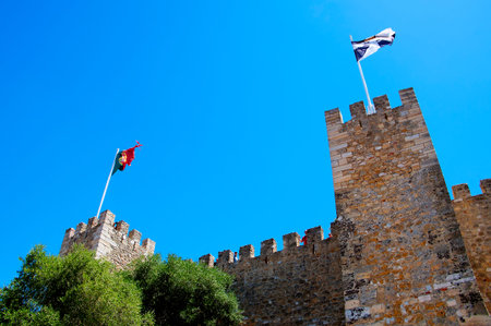 Sao Jorge Castle is a Moorish castle occupying a commanding hilltop overlooking the historic centre of the Portuguese city of Lisbon and Tagus River.のeditorial素材