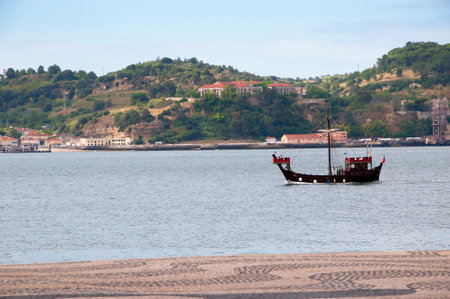Oldfashioned boat on the River Tagus in Lisbon Portugalのeditorial素材