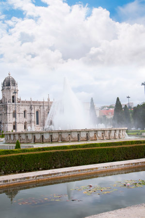 The Jernimos Monastery  with the Praa do Imprio: gardens centred upon a large fountain, laid out during World War II in Lisbon Portugalのeditorial素材