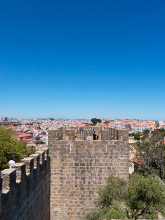 Sao Jorge Castle is a Moorish castle occupying a commanding hilltop overlooking the historic centre of the Portuguese city of Lisbon and Tagus River. The strongly fortified citadel dates from medieval period of Portuguese history, and is one of the main tのeditorial素材