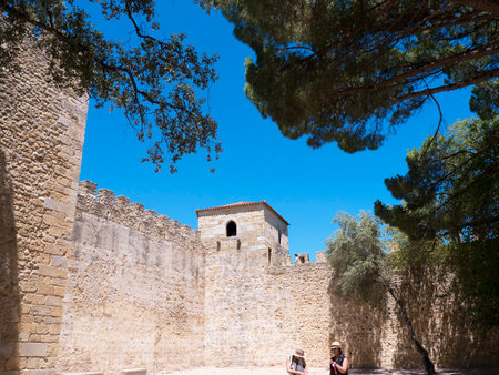 Sao Jorge Castle is a Moorish castle occupying a commanding hilltop overlooking the historic centre of the Portuguese city of Lisbon and Tagus River. The strongly fortified citadel dates from medieval period of Portuguese history, and is one of the main tのeditorial素材