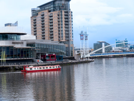 The Salford Quays was once Manchester's Docklands but now it hosts MediacityUK,the Lowry Theatre and the Imperial War Museum Northのeditorial素材