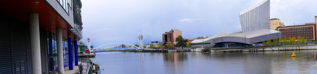 The Salford Quays was once Manchester's Docklands but now it hosts MediacityUK,the Lowry Theatre and the Imperial War Museumのeditorial素材