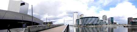 The Salford Quays was once Manchester's Docklands but now it hosts MediacityUK,the Lowry Theatre and the Imperial War Museumのeditorial素材
