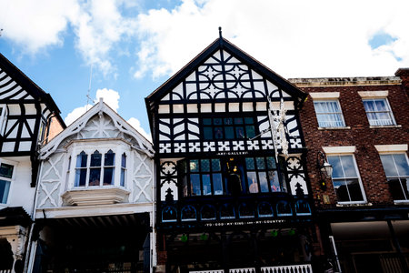 The Rows are unique in Britain. They consist of buildings with shops or dwellings on the lowest two storeys. Much of the architecture of central Chester looks medieval and some of it is but by far the greatest part of it, including most of the black-and-wのeditorial素材