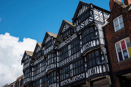 The Rows are unique in Britain. The Rows are Tudor Black and White Buildings in Chester the county city of Cheshire in England. Much of the architecture of central Chester looks medieval and some of it is but by far the greatest part of it, including mostのeditorial素材