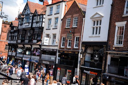 The Rows are unique in Britain. The Rows are Tudor Black and White Buildings in Chester the county city of Cheshire in England. Much of the architecture of central Chester looks medieval and some of it is but by far the greatest part of it, including mostのeditorial素材