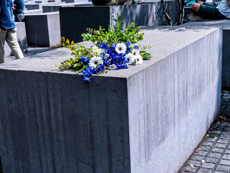 The Holocaust memorial by the Brandenburg Gate in Berlin Germany The monument is located on the former location of the Berlin Wall, where the âdeath stripâ once divided the city. The monument is composed of 2711 rectangular concrete blocks, laid out iのeditorial素材