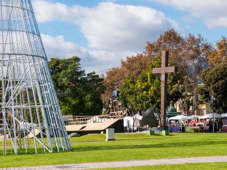 Christmas decorations and Cross in Park and play area in Funchal Madeira Portugalのeditorial素材