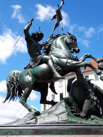 Statue of St George killing the Dragon in the Nikolaikirche area of Berlin Germanyのeditorial素材