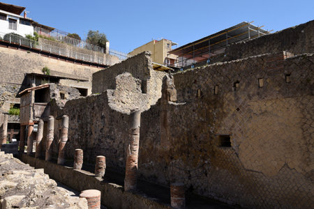 Street in Herculaneum, or Ercolana, near Naples in Italy was not buried by falling rocks like Pompeii was in the eruption of Vesuvius in 79AD, instead it was engulfed in boiling mud and superheated air. This preserved roofs, buildings and artefactsのeditorial素材