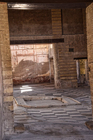 Mosaic floor in villa in Herculaneum, or Ercolano, near Naples in Italy was not buried by falling rocks like Pompeii was in the eruption of Vesuvius in 79AD, instead it was engulfed in boiling mud and superheated air. This preserved roofs, buildings and aのeditorial素材