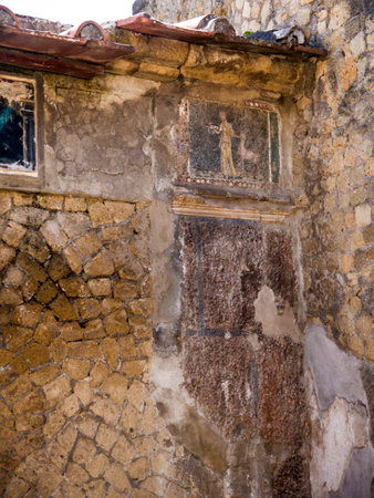 Fresco in villa in Herculaneum, or Ercolana, near Naples in Italy was not buried by falling rocks like Pompeii was in the eruption of Vesuvius in 79AD, instead it was engulfed in boiling mud and superheated air. This preserved roofs, buildings and artefacのeditorial素材