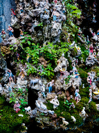 Water Fountain in the street in Amalfi with tiny figures depicting life in the Mountains of the areaのeditorial素材