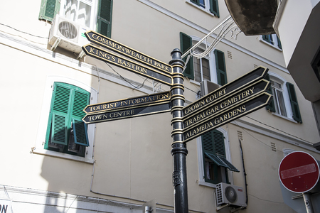 Signpost on the Rock of Gibraltar combines of English and Spanish styles, with balconies of Spain being mixed with British fortificationsのeditorial素材