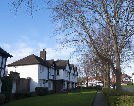 Homes at the model village of Port Sunlight near Liverpool, created by William Hesketh Lever for his Sunlight soap factory workers in 1888. The many different styles of houses make an interested tour of post 19th century housing.のeditorial素材