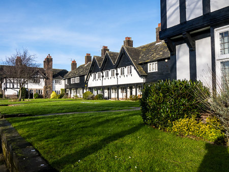 Homes at the model village of Port Sunlight near Liverpool, created by William Hesketh Lever for his Sunlight soap factory workers in 1888. The many different styles of houses make an interested tour of post 19th century housing.のeditorial素材