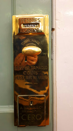 Antique Brass Mechanisms on Ladies Room Toilet Doors at The Lady Lever Art Gallery in Port Sunlight....
