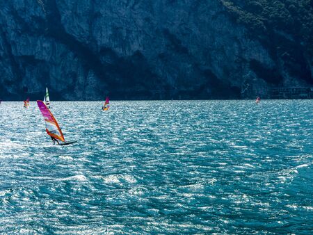 Lake Garda in Northern Italy is famous for its constant breezes which makes this a windsurfers paradise,のeditorial素材