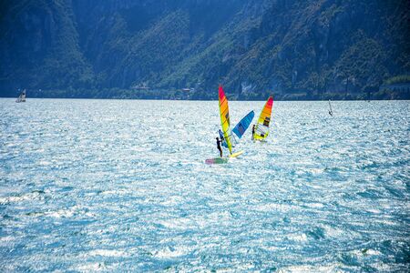 Lake Garda in Northern Italy is famous for its constant breezes which makes this a windsurfers paradise,のeditorial素材