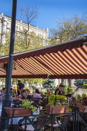 Cafe in front of the VigadÃ³ (usually translated as "Place for Merriment") is Budapest's second largest concert hall, located on the Eastern bank of the Danube in Budapest, Hungary.のeditorial素材