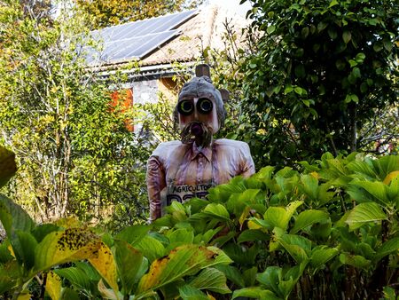 The Parish Church of Prazeres at Calheta.  Behind the church is an educational Farm or  physic garden growing medicinal herbs with amusing scarecrows for the childrenのeditorial素材