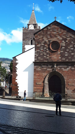 The Cathedral of our Lady of the Assumption called the Se in the Tree Lined Main Shopping Streets in Funchal Madeira Portugal.のeditorial素材