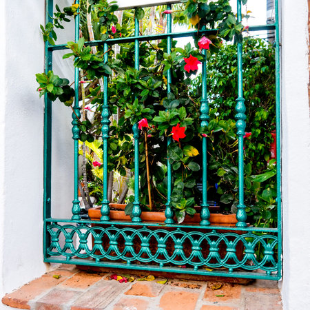 Gate to a Garden of Flowers in Nerja on the Costa del Sol in Spain