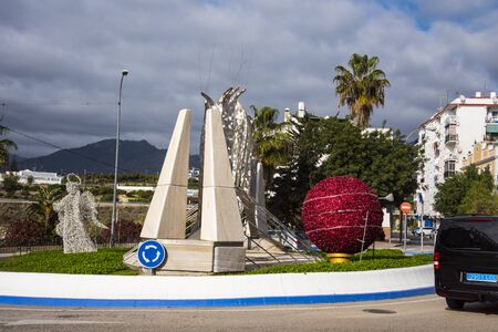 Sculpture on traffic island in Nerja, a holiday resort on the eastern end of the Costa del Sol.のeditorial素材