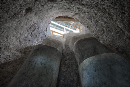 stairs leading up from an underground tomb to surface in Tierradentro Colombia