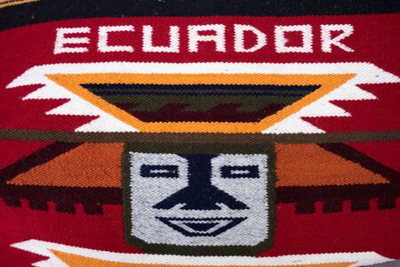 colourful traditional blanket closeup in Otavalo Ecuador outdoor marketの写真素材