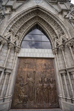 entry door of basilica de voto nacional Quito a neo-gothic style architectureの写真素材