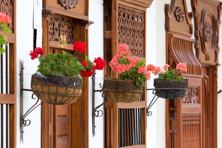 flowers with colonial woodwork in Colombiaのeditorial素材