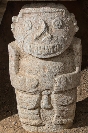 closeup details of a pre-columbian stone statue in the San Agustin archaeological park in Colombiaの写真素材