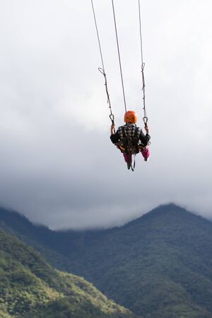 July 15, 2016 Banos, Ecuador: gigantic cable swings above canyons is a popular actibvity in the areaのeditorial素材