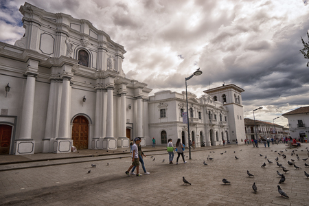 July 6, 2017 Popayan, Colombia: people walk through the main plaza of the historic centre of the colonial cityのeditorial素材